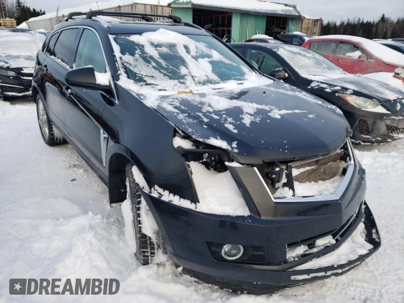 2013 Cadillac SRX Premium Collection with VIN 3GYFNJE35DS654442, listed as a Copart auction lot 43069785 with Not provided miles and Salvage title. Bid and sale history available at DreamBid. Image 4.