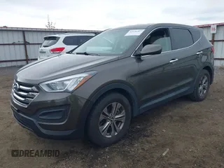 2014 Hyundai Santa Fe z VIN 5XYZTDLB1EG144290, wystawiony jako IAAI lot #42126367 z przebiegiem 138 525 mil mil oraz . Historia ofert i sprzedaży dostępna na DreamBid. Obrazek 17.
