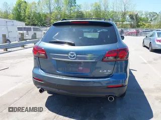 2015 Mazda CX-9 Grand Touring with VIN JM3TB3DV4F0448210, listed as a IAAI auction lot 42061711 with 149,289 mi miles. Bid and sale history available at carsss.com. Image 16.