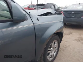 2010 Mercury Mariner Premier with VIN 4M2CN9H75AKJ06979, listed as a IAAI auction lot 41156374 with 149,784 mi miles and . Bid and sale history available at DreamBid. Image 13.