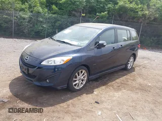 2014 Mazda 5 Grand Touring z VIN JM1CW2DL9E0171350, wystawiony jako IAAI lot #42113779 z przebiegiem 90 120 mil mil oraz . Historia ofert i sprzedaży dostępna na DreamBid. Obrazek 2.
