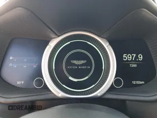 2021 Aston Martin DB11 z VIN SCFRMFCW0MGM10150, wystawiony jako Copart lot #69046124 z przebiegiem 7260 mil mil oraz Szkody całkowita. Historia ofert i sprzedaży dostępna na DreamBid. Obrazek 9.