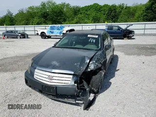 2007 Cadillac CTS z VIN 1G6DM57T070197820, wystawiony jako Copart lot #54568335 z przebiegiem 108 328 mil mil oraz Szkoda całkowita • Salvage title. Historia ofert i sprzedaży dostępna na DreamBid. Obrazek 13.