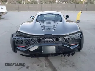 2023 McLaren Artura z VIN SBM16AEA4PW001449, wystawiony jako IAAI lot #41347791 z przebiegiem 4703 mil mil oraz . Historia ofert i sprzedaży dostępna na DreamBid. Obrazek 16.