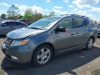 2011 Honda Odyssey Touring Elite with VIN 5FNRL5H96BB043339, listed as a IAAI auction lot 42174767 with 161,233 mi miles and . Bid and sale history available at DreamBid. Image 2.