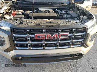 2023 GMC Canyon 4WD AT4 with VIN 1GTP6DEK3P1151112, listed as a Copart auction lot 77150454 with 5,573 mi miles and Non Repairable. Bid and sale history available at carsss.com. Image 11.