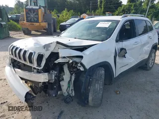 2018 Jeep Cherokee Latitude Plus z VIN 1C4PJLLX5JD511784, wystawiony jako IAAI lot #42361691 z przebiegiem 120 965 mil mil oraz . Historia ofert i sprzedaży dostępna na DreamBid. Obrazek 6.