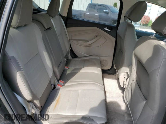 2016 Ford Escape SE z VIN 1FMCU0G99GUA13835, wystawiony jako Copart lot #52401865 z przebiegiem 130 143 mil mil oraz Szkoda całkowita • Salvage title. Historia ofert i sprzedaży dostępna na DreamBid. Obrazek 11.