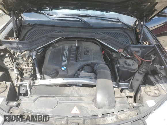 2015 BMW X6 xDrive35i z VIN 5UXKU2C58F0N77513, wystawiony jako Copart lot #55859345 z przebiegiem 82 560 mil mil oraz Szkoda całkowita • Salvage title. Historia ofert i sprzedaży dostępna na DreamBid. Obrazek 12.