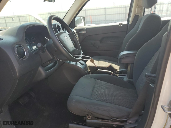 2010 Jeep Patriot Sport with VIN 1J4NT2GA4AD640840, listed as a Copart auction lot 67026894 with 100,637 mi miles and Salvage Title. Bid and sale history available at carsss.com. Image 7.