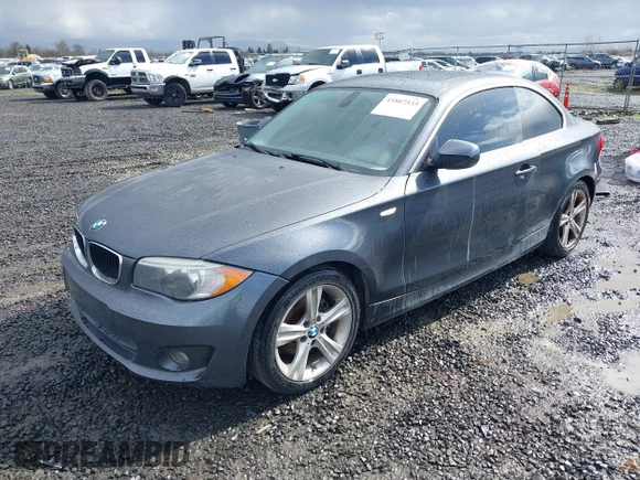 2013 BMW 1 Series 128i with VIN WBAUP7C5XDVP24796, listed as a IAAI auction lot 41807533 with 157,614 mi miles and . Bid and sale history available at carsss.com. Image 2.