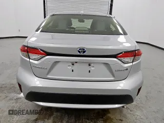 2021 Toyota Corolla Hybrid LE with VIN JTDEAMDE4MJ009929, listed as a Copart auction lot 59626985 with 91,817 mi miles and Clean title. Bid and sale history available at DreamBid. Image 6.