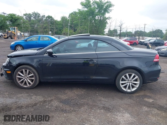 2014 Volkswagen Eos Sport with VIN WVWBW8AH2EV003356, listed as a IAAI auction lot 42394312 with 70,448 mi miles and . Bid and sale history available at DreamBid. Image 15.