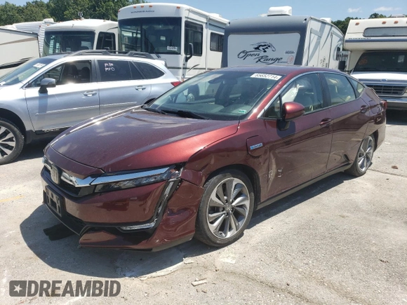 2018 Honda Clarity Touring with VIN JHMZC5F34JC006234, listed as a Copart auction lot 65652714 with 63,704 mi miles and Salvage Title. Bid and sale history available at DreamBid. Image 1.