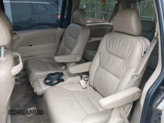 2009 Honda Odyssey EX-L with VIN 5FNRL38759B022866, listed as a IAAI auction lot 42200965 with 145,641 mi miles and . Bid and sale history available at DreamBid. Image 8.