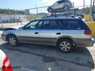 1999 Subaru Legacy Wagon Outback with VIN 4S3BG6850X6621723, listed as a IAAI auction lot 41932992 with 283,200 mi miles. Bid and sale history available at carsss.com. Image 14.