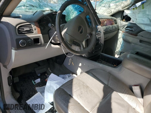 2010 GMC Sierra 1500 SLT z VIN 3GTRCWE04AG107589, wystawiony jako Copart lot #52244005 z przebiegiem Nie podano mil oraz Szkody całkowita. Historia ofert i sprzedaży dostępna na DreamBid. Obrazek 8.