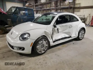 2012 Volkswagen Beetle 2.5L PZEV with VIN 3VWJP7AT3CM610930, listed as a Copart auction lot 79702664 with 0 mi miles and Salvage Title. Bid and sale history available at carsss.com. Image 1.