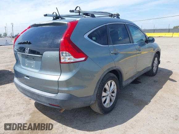 2012 Honda CR-V EX-L with VIN JHLRM3H74CC003987, listed as a IAAI auction lot 42046672 with 143,277 mi miles. Bid and sale history available at carsss.com. Image 4.