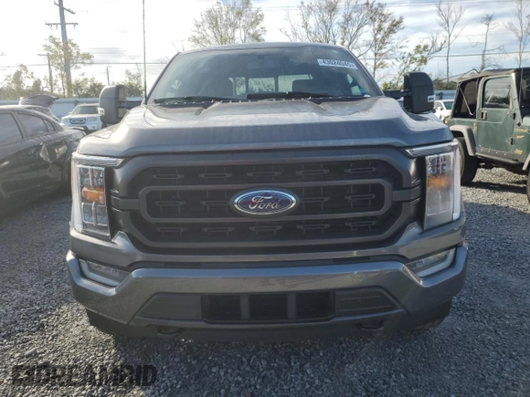 2023 Ford F-150 XL with VIN 1FTEW1EP4PFB38678, listed as a Copart auction lot 43024045 with 8,718 mi miles and Salvage title. Bid and sale history available at DreamBid. Image 5.
