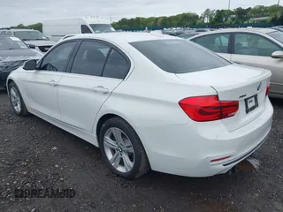 2018 BMW 3 Series 330i xDrive with VIN WBA8D9C52JEM32318, listed as a IAAI auction lot 42309352 with 61,828 mi miles and . Bid and sale history available at DreamBid. Image 3.
