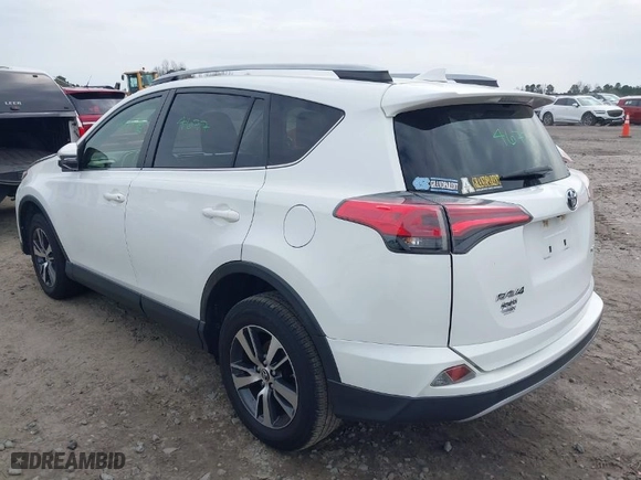 2017 Toyota RAV4 XLE with VIN JTMWFREV9HJ137607, listed as a IAAI auction lot 41741934 with 28,852 mi miles. Bid and sale history available at carsss.com. Image 3.