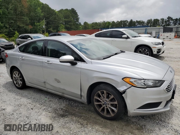 2017 Ford Fusion SE with VIN 3FA6P0H71HR260335, listed as a Copart auction lot 57857705 with 160,133 mi miles and Salvage title. Bid and sale history available at DreamBid. Image 4.