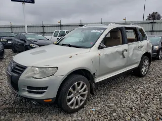 2010 Volkswagen Touareg VR6 with VIN WVGBF7A9XAD002471, listed as a Copart auction lot 83592274 with 202,497 mi miles and Salvage Title. Bid and sale history available at DreamBid. Image 1.