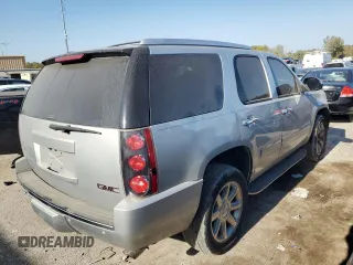 2013 GMC Yukon Denali with VIN 1GKS2EEF0DR311141, listed as a Copart auction lot 74823594 with 125,580 mi miles and Salvage Title. Bid and sale history available at carsss.com. Image 3.