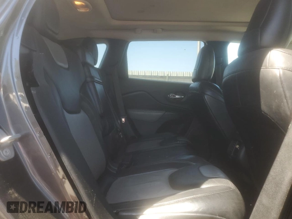 2014 Jeep Cherokee Limited z VIN 1C4PJMDB7EW138735, wystawiony jako Copart lot #54127145 z przebiegiem Nie podano mil oraz Szkoda całkowita • Salvage title. Historia ofert i sprzedaży dostępna na DreamBid. Obrazek 10.