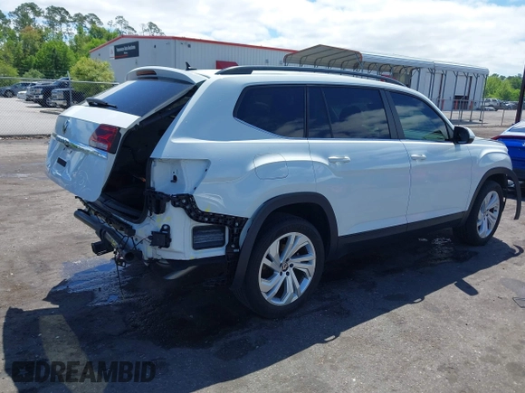 2021 Volkswagen Atlas SE z VIN 1V2WR2CA2MC529355, wystawiony jako IAAI lot #41972048 z przebiegiem 63 970 mil mil oraz . Historia ofert i sprzedaży dostępna na DreamBid. Obrazek 4.