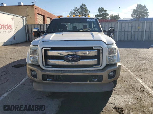 2014 Ford F-450 XL with VIN 1FT8W4DT4EEA08741, listed as a Copart auction lot 77214904 with 168,838 mi miles and Salvage title. Bid and sale history available at DreamBid. Image 5.