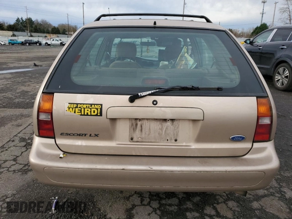 1997 Ford Escort LX with VIN 3FALP15P7VR132710, listed as a Copart auction lot 87546515 with 185,646 mi miles and Salvage Title. Bid and sale history available at DreamBid. Image 6.