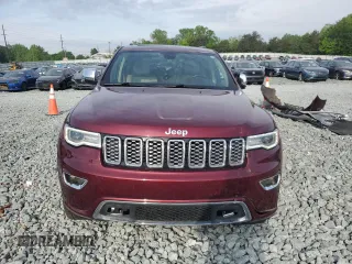 2017 Jeep Grand Cherokee Overland z VIN 1C4RJFCG5HC615878, wystawiony jako Copart lot #52087675 z przebiegiem 90 353 mil mil oraz Szkody całkowita. Historia ofert i sprzedaży dostępna na DreamBid. Obrazek 5.