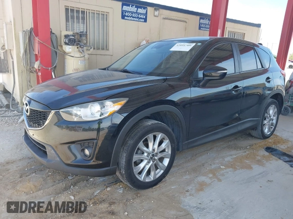 2015 Mazda CX-5 Grand Touring with VIN JM3KE4DY7F0481883, listed as a IAAI auction lot 42091709 with 184,248 mi miles and . Bid and sale history available at DreamBid. Image 18.