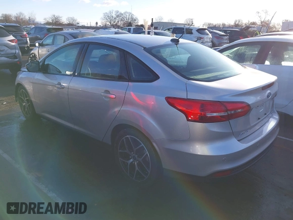 2017 Ford Focus SEL with VIN 1FADP3H21HL336597, listed as a IAAI auction lot 41729173 with 166,140 mi miles. Bid and sale history available at carsss.com. Image 3.