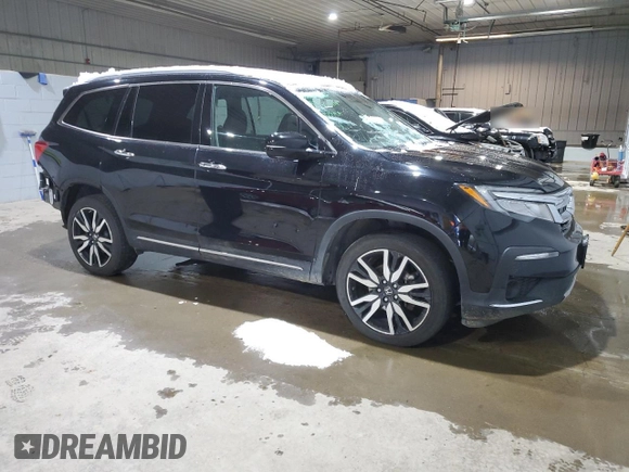 2021 Honda Pilot Elite with VIN 5FNYF6H05MB005324, listed as a Copart auction lot 82866734 with 126,630 mi miles and Salvage Title. Bid and sale history available at DreamBid. Image 4.
