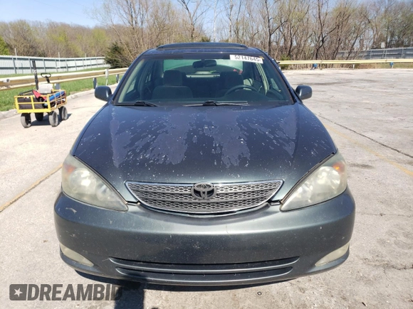 2003 Toyota Camry LE z VIN 4T1BF32K63U559665, wystawiony jako Copart lot #52147645 z przebiegiem 322 212 mil mil oraz Szkoda całkowita • Salvage title. Historia ofert i sprzedaży dostępna na DreamBid. Obrazek 5.