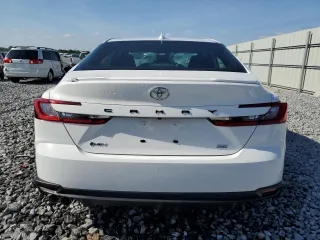 2025 Toyota Camry LE with VIN 4T1DAACK2SU060290, listed as a Copart auction lot 54754665 with 9,293 mi miles and Clean Title. Bid and sale history available at carsss.com. Image 6.