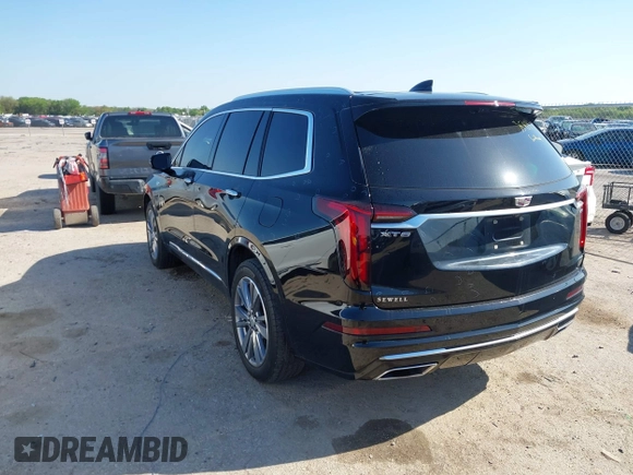2022 Cadillac XT6 Premium Luxury with VIN 1GYKPCRS3NZ156413, listed as a IAAI auction lot 41952856 with 40,046 mi miles and . Bid and sale history available at DreamBid. Image 3.