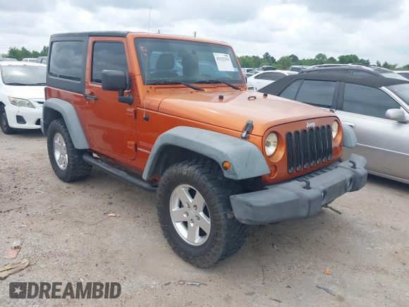 2011 Jeep Wrangler Sport with VIN 1J4AA2D1XBL579882, listed as a IAAI auction lot 42122353 with 153,885 mi miles and . Bid and sale history available at carsss.com. Image 1.