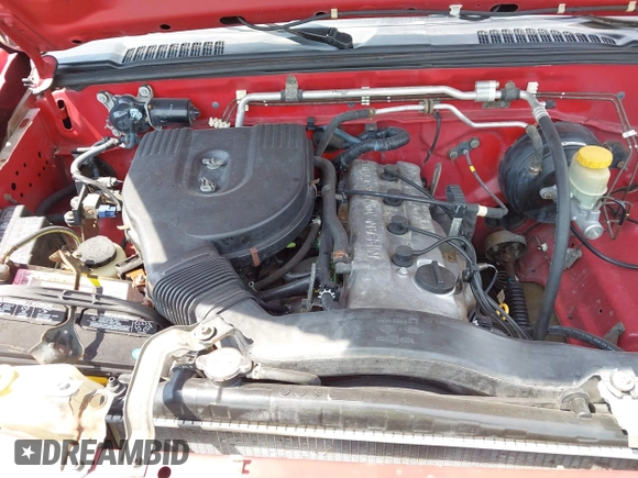 2002 Nissan Frontier XE with VIN 1N6DD26S32C369623, listed as a IAAI auction lot 42567702 with 261,433 mi miles and . Bid and sale history available at DreamBid. Image 10.
