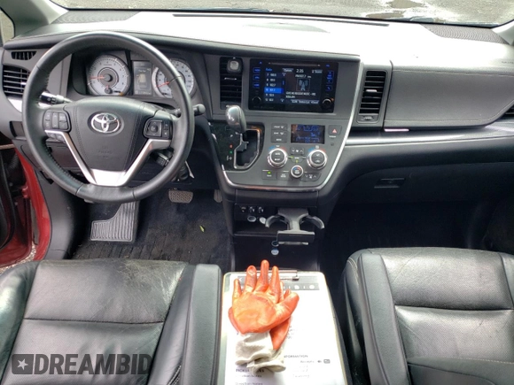 2016 Toyota Sienna SE with VIN 5TDXK3DC6GS737502, listed as a Copart auction lot 57361275 with 110,512 mi miles and Salvage title. Bid and sale history available at DreamBid. Image 8.
