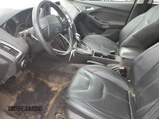 2017 Ford Focus Titanium z VIN 1FADP3N29HL240527, wystawiony jako Copart lot #62891695 z przebiegiem 126 926 mil mil oraz Szkoda całkowita • Salvage title. Historia ofert i sprzedaży dostępna na DreamBid. Obrazek 7.
