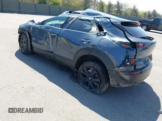 2024 Mazda CX-30 S Preferred z VIN 3MVDMBCMXRM640631, wystawiony jako IAAI lot #41900958 z przebiegiem 10 332 mil mil oraz . Historia ofert i sprzedaży dostępna na DreamBid. Obrazek 3.