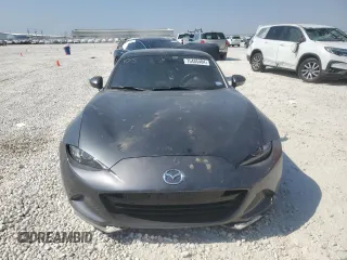 2023 Mazda MX-5 Miata Grand Touring z VIN JM1NDAM70P0550719, wystawiony jako Copart lot #75485484 z przebiegiem 21 110 mil mil oraz Szkoda całkowita • Salvage title. Historia ofert i sprzedaży dostępna na DreamBid. Obrazek 5.