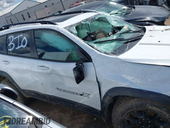 2022 Jeep Cherokee X with VIN 1C4PJMCX1ND552845, listed as a IAAI auction lot 41877665 with Not provided miles and . Bid and sale history available at DreamBid. Image 13.