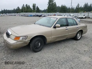 2000 Mercury Grand Marquis LS z VIN 2MEFM75W8YX672775, wystawiony jako Copart lot #59609885 z przebiegiem 172 837 mil mil oraz Szkoda całkowita • Salvage title. Historia ofert i sprzedaży dostępna na DreamBid. Obrazek 1.