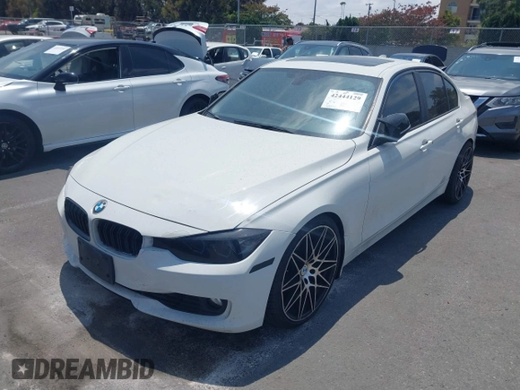2014 BMW 3 Series 328i with VIN WBA3C1C52EK110753, listed as a IAAI auction lot 42444129 with 169,035 mi miles and . Bid and sale history available at DreamBid. Image 6.