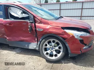 2014 Ford Escape Titanium with VIN 1FMCU9J91EUB53601, listed as a IAAI auction lot 42066465 with 105,933 mi miles and . Bid and sale history available at DreamBid. Image 6.